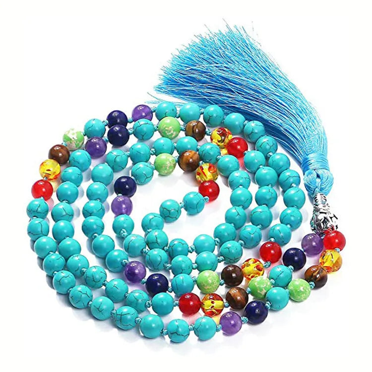 Long geometric agate and gemstone tassel necklace showing colourful beads including amethyst and lapis lazuli.