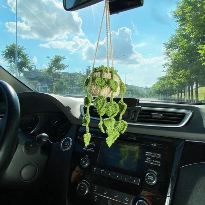Green and white knitted wool plant ornament for car dashboard with hanging cord