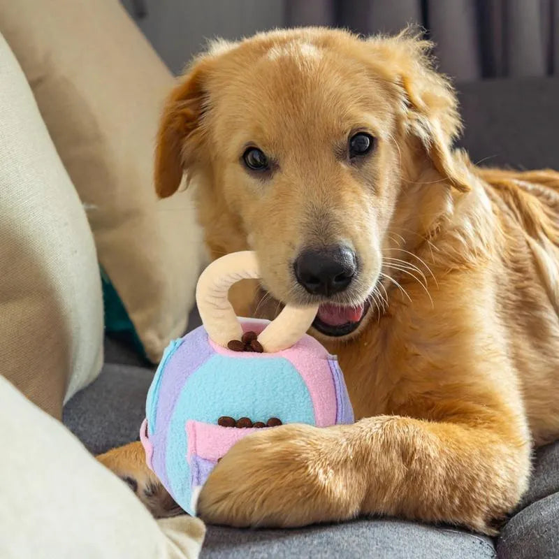 Green plush squeaky ball dog toy with treat pockets for interactive play with small to medium dogs