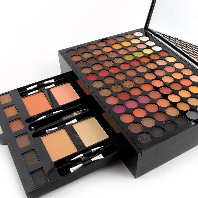 Piano-shaped makeup palette open showing 190 powder pans including eyeshadows, blushers and contour powders