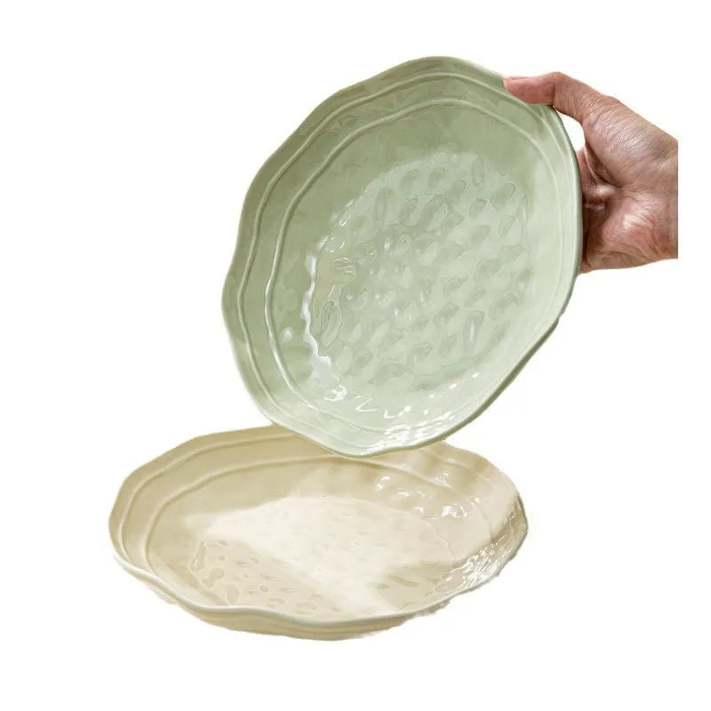 Seven-piece ceramic tableware set in solid colours with simple modern design