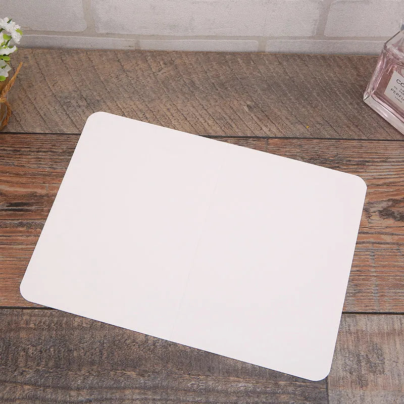 Pack of 100 blank folded kraft paper greeting cards in 10x15cm size, showing black, cowhide brown, and white colour options