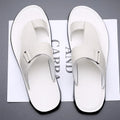 Men's light brown cowhide leather open-toe beach slippers with a rubber sole.
