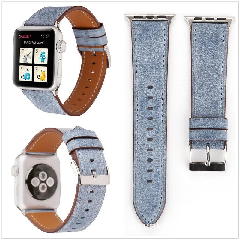 Genuine leather strap with folding buckle in multiple colours including blue, brown, and pink.