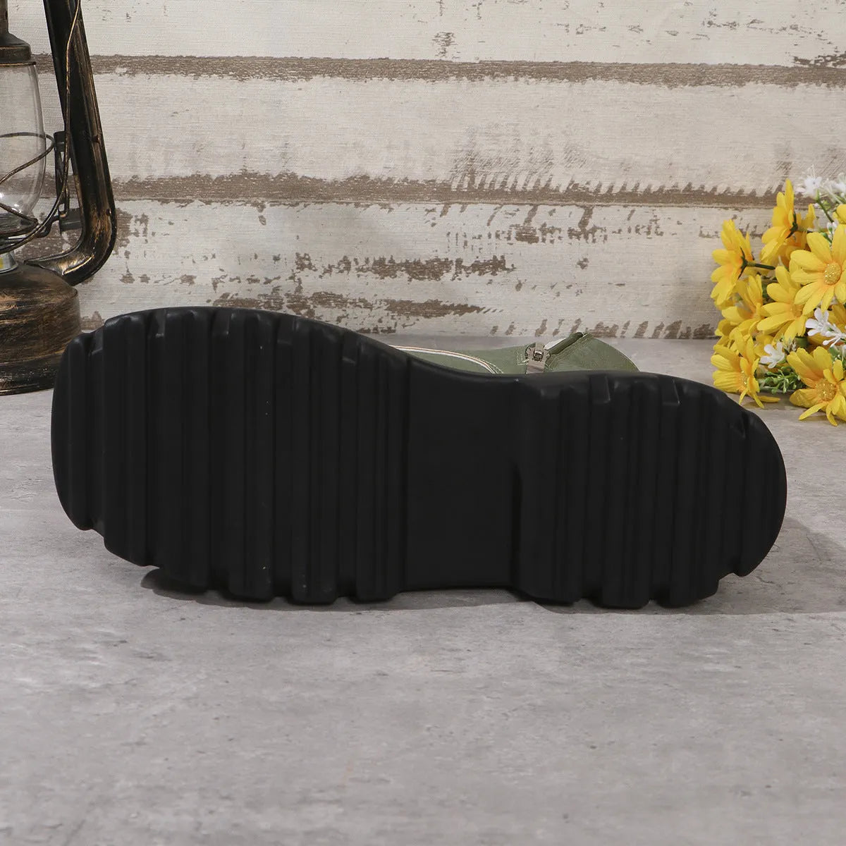 Women's black retro platform Martin boots with chunky heel and side zipper detail.