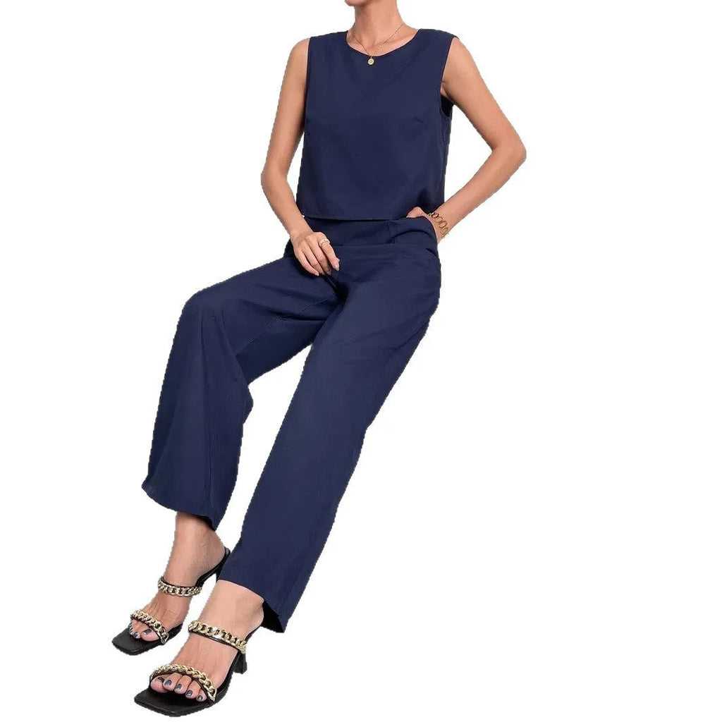Women's red sleeveless top and wide leg trousers two-piece set laid flat