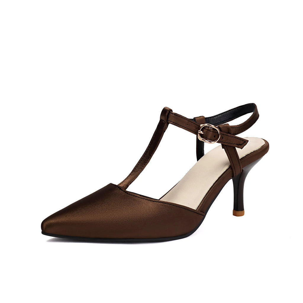 Pointed T-strap high heels in top grain leather, available in black and brown
