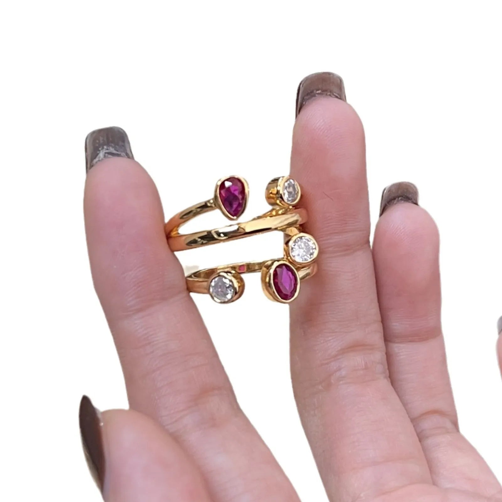 Double-headed diamond ring with irregular cross geometric shape in two-tone colours