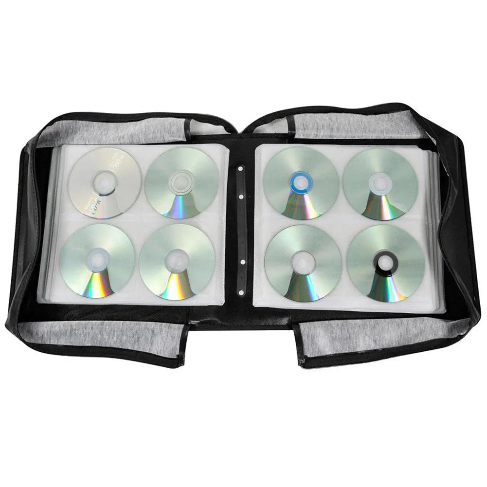 Black Oxford fabric CD DVD storage wallet with top hand strap and zip closure.