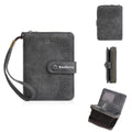 Women's black PU coin purse with zipper closure showing integrated card slots