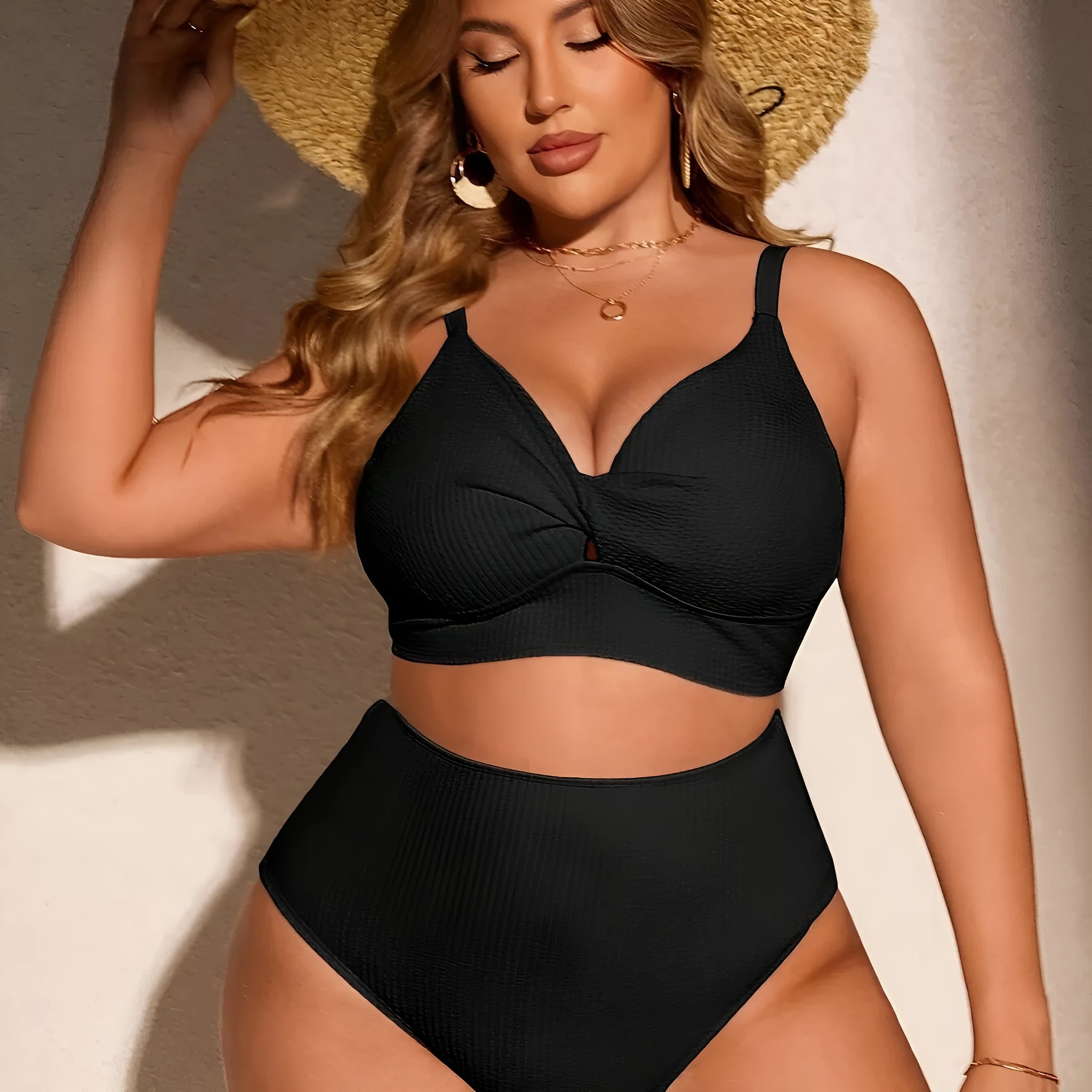 Women's black two-piece bikini set in polypropylene fibre, sizes 1XL to 4XL, with brief-style shorts