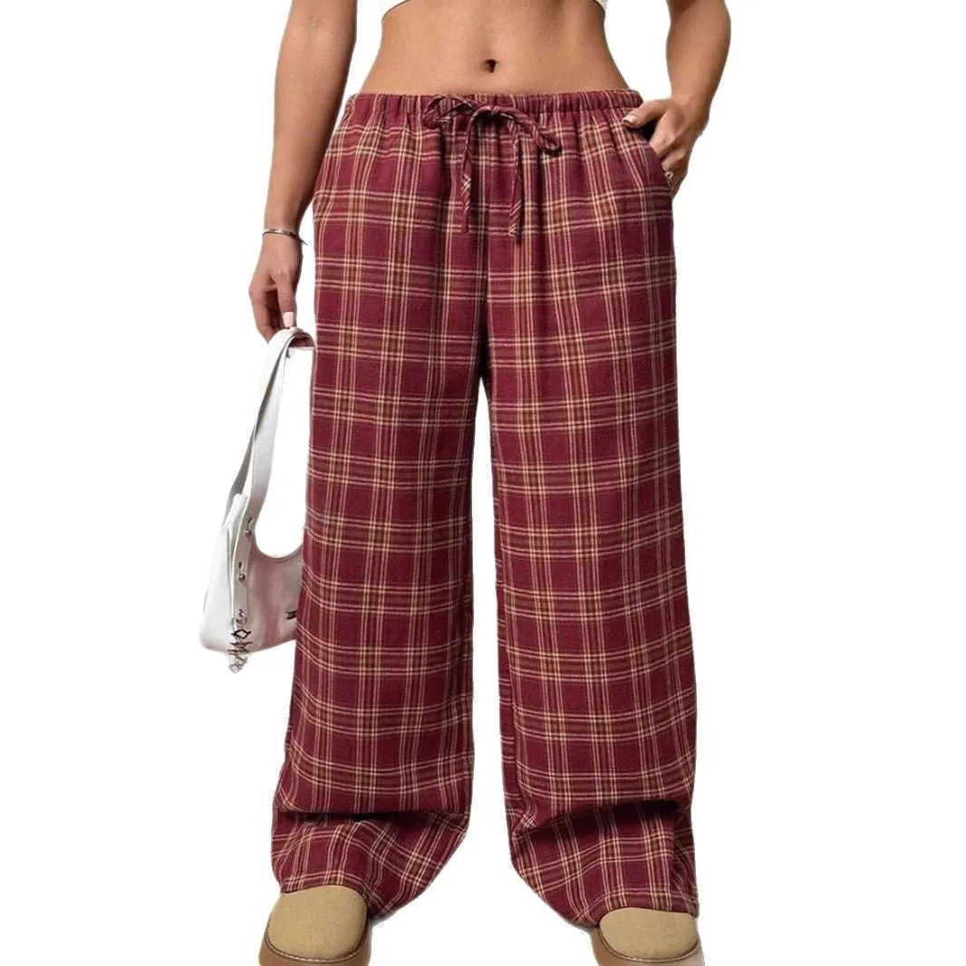 Women's plaid pattern casual trousers with loose fit, drawstring waist, and functional pockets