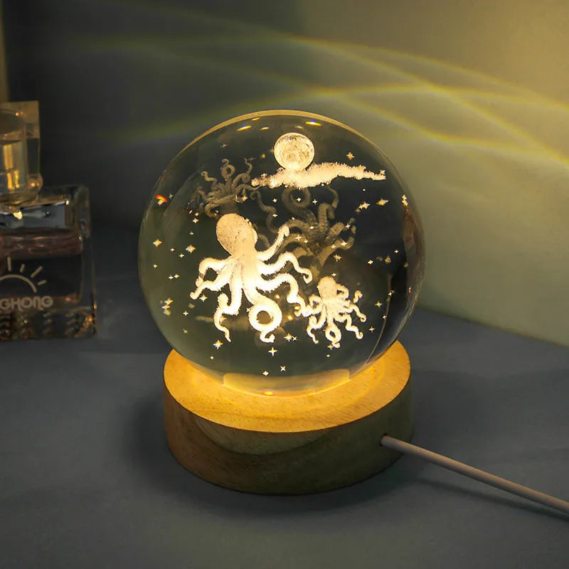 Transparent crystal ball night lamp with 3D carved jellyfish design, showing 6cm size on round base.