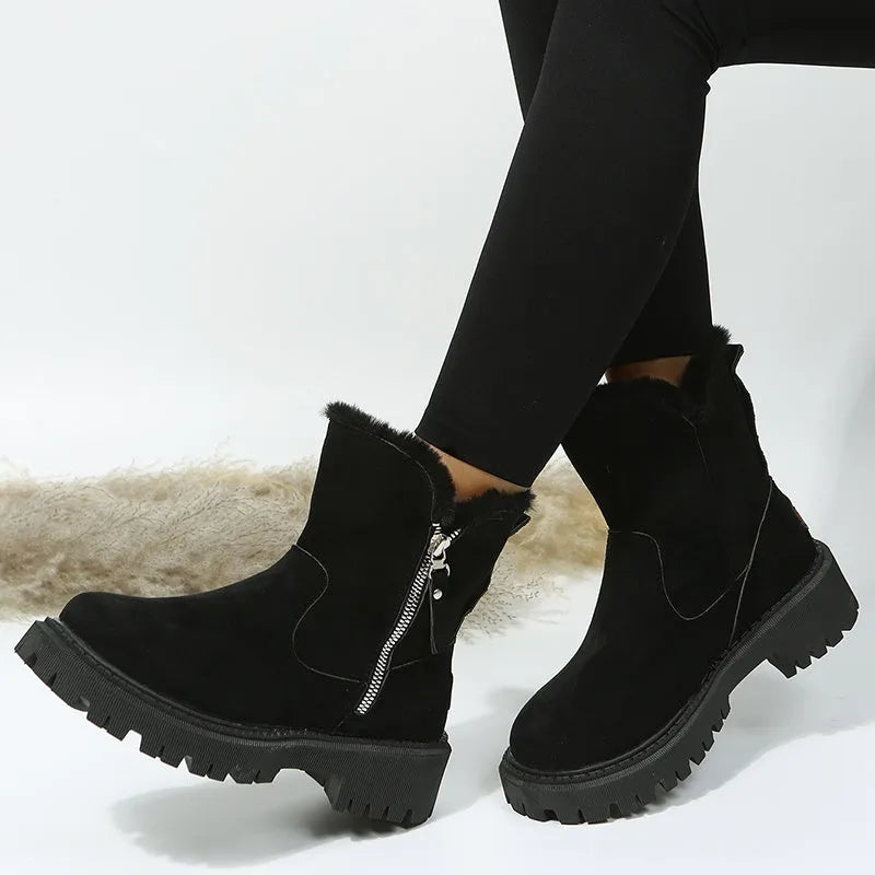 Women's black thick plush high-top snow boots with a side zipper and non-slip rubber sole.