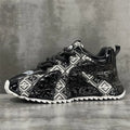 Men's creamy-white casual low-top shoes with embroidery stitching on the PU upper and a thick platform rubber sole.