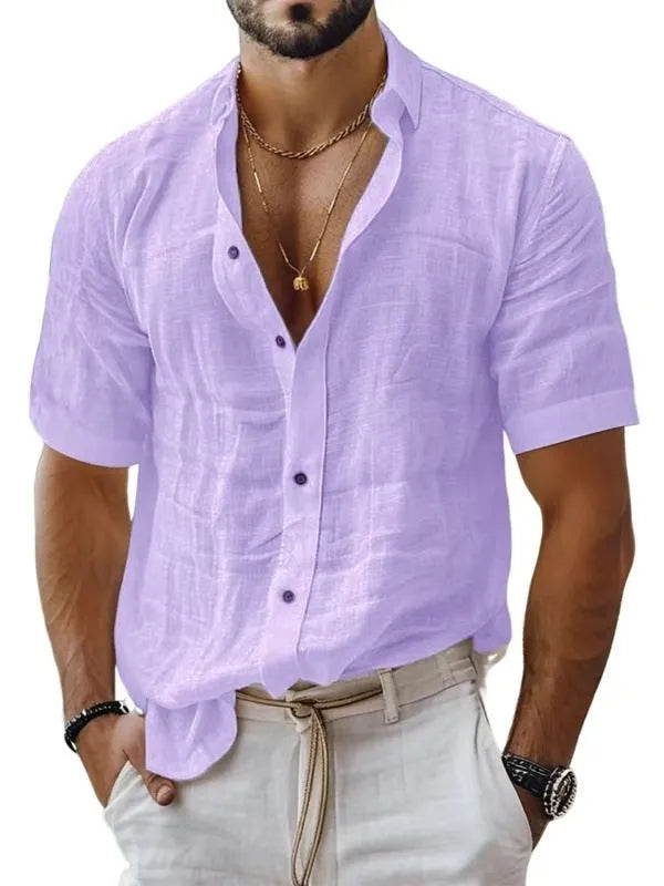 Men's solid colour short sleeve lapel shirt in light green shown on a hanger