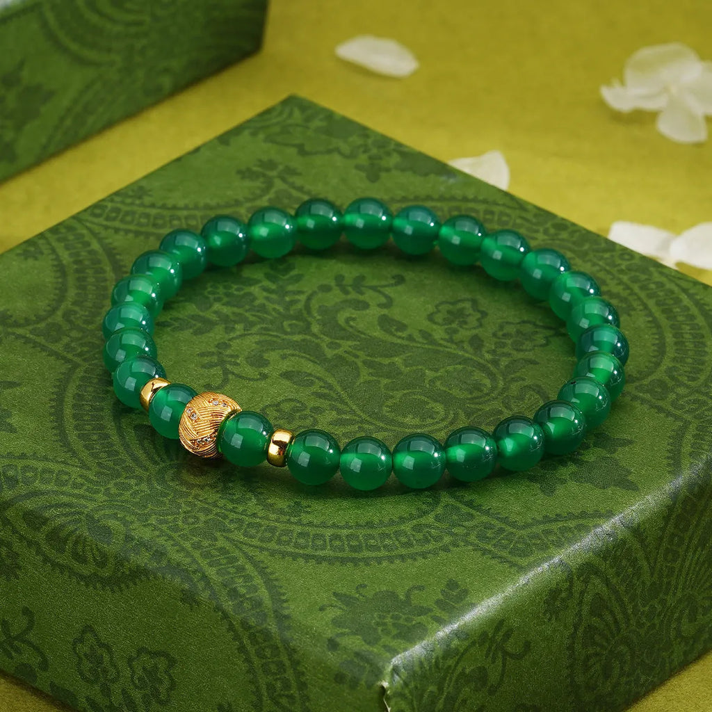 Green agate and sterling silver bracelet with geometric beads and gold electroplated details