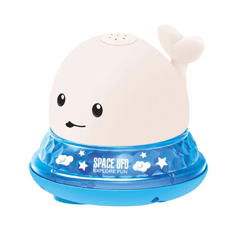 Grey and white cartoon whale bath toy floating in water with spray fountain and LED lights