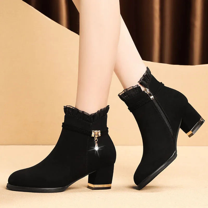 Black Season Tide sandal boots with mid-heel, tassel detail, and round toe for women