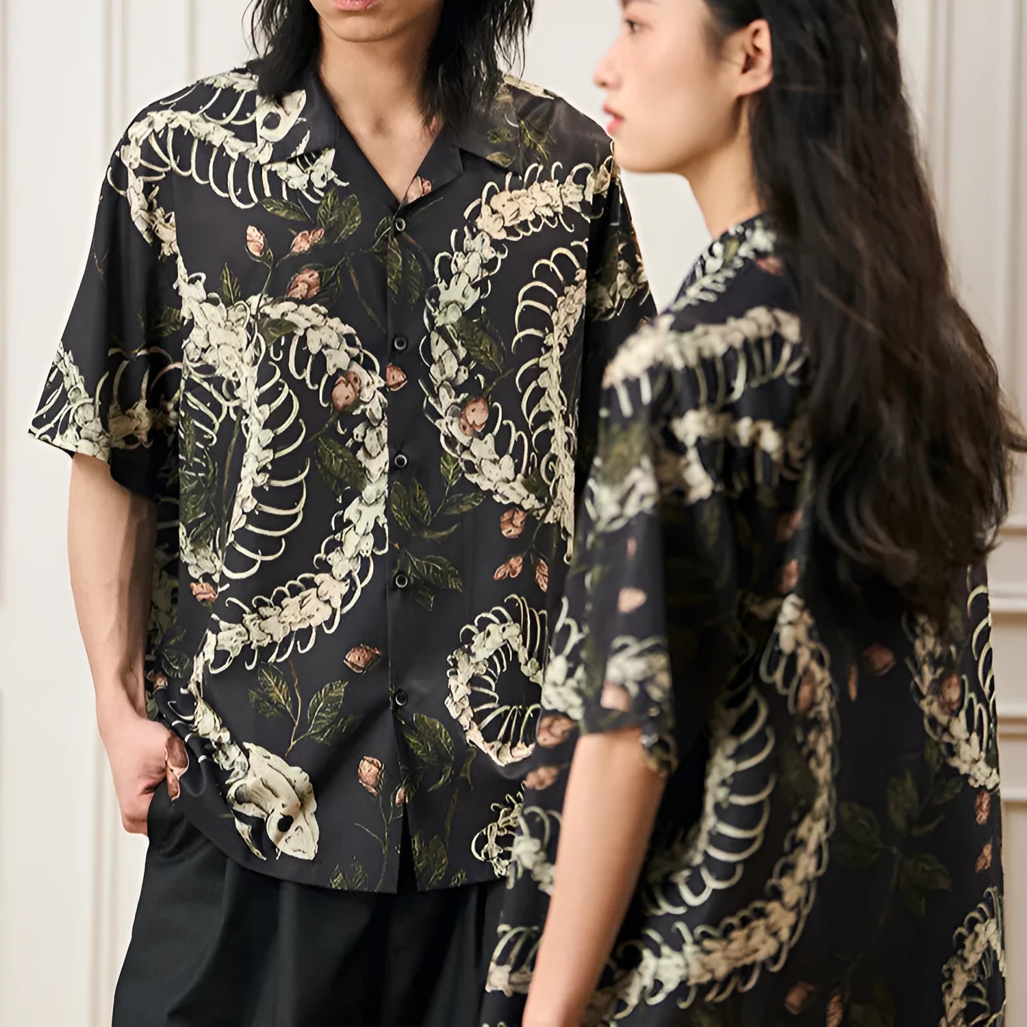 Short sleeve Cuban collar shirt featuring a printed snake bone and flower pattern in a loose fit.