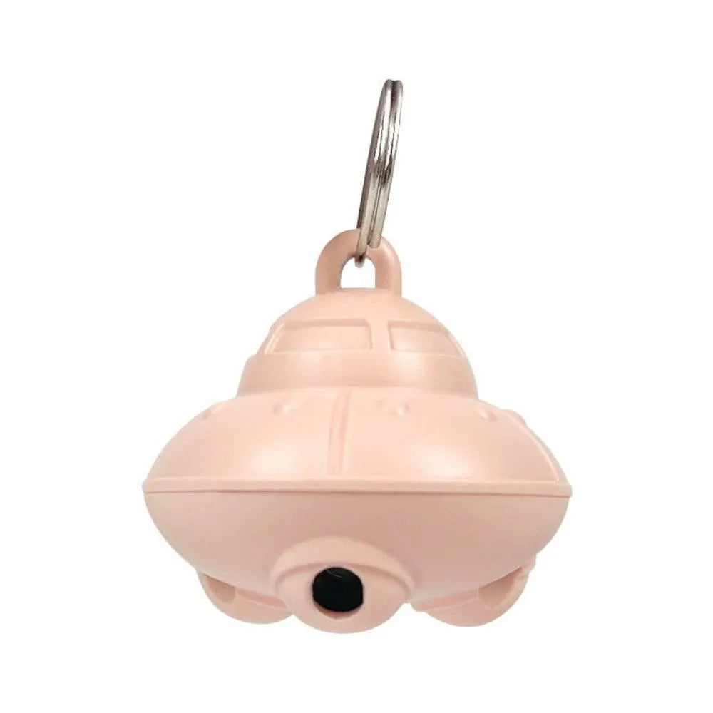 Green or pink cat collar laser toy with compact 3cm plastic housing showing USB charging port