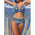 Women's three-piece bikini swimsuit with cross bandage bra and high-waist veiled briefs in blue colour