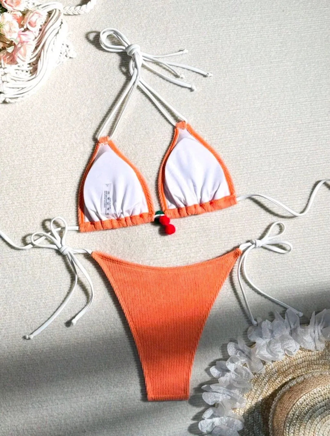 Solid colour nylon bikini briefs swimsuit in briefs style on a mannequin.