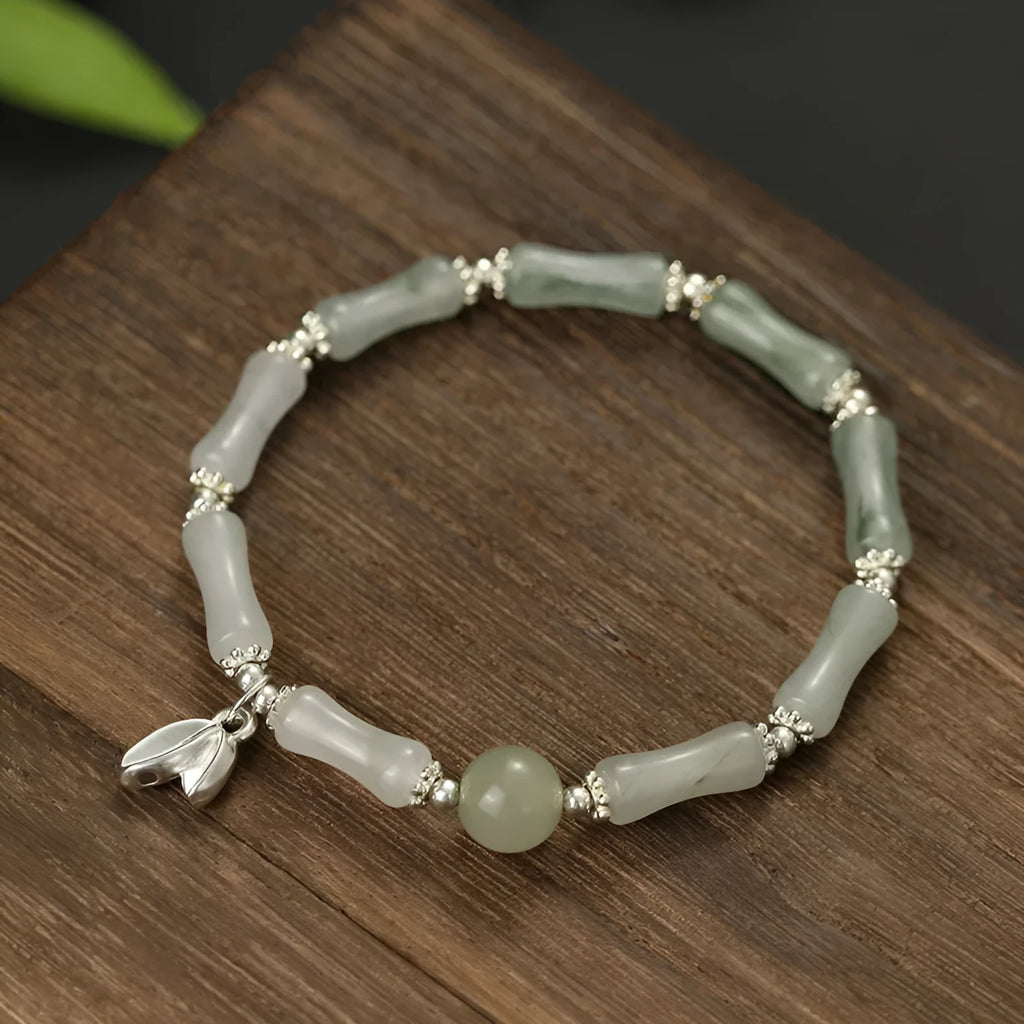 Natural Tianshan green bamboo sterling silver bracelet for women with antique style.