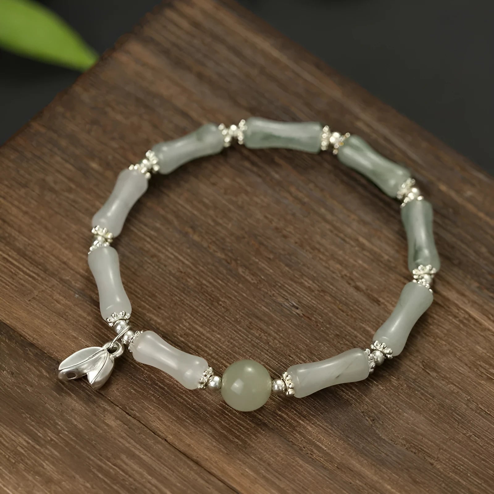 Natural Tianshan green bamboo sterling silver bracelet for women with antique style.