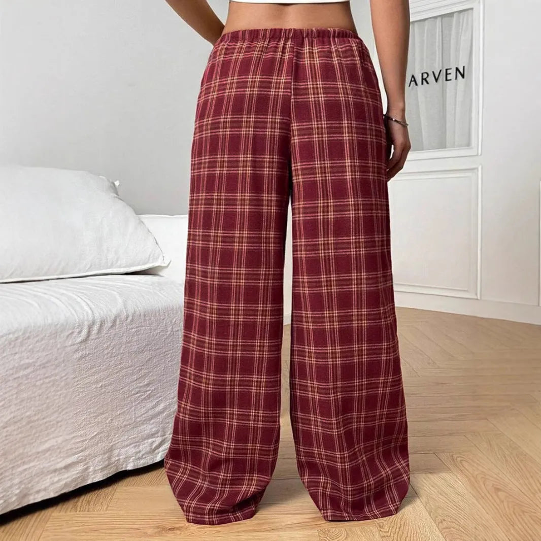 Women's plaid pattern casual trousers with loose fit, drawstring waist, and functional pockets