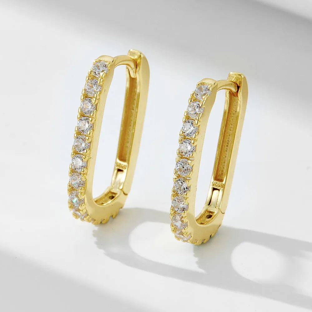 Sterling silver oval geometric ear clips with zircon stones in white or yellow finish
