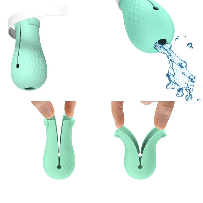 Four green silicone cat anti-scratch foot cover gloves for paw protection during grooming