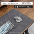 Winter office desk mat in grey felt cork material showing non-slip texture and oversized format