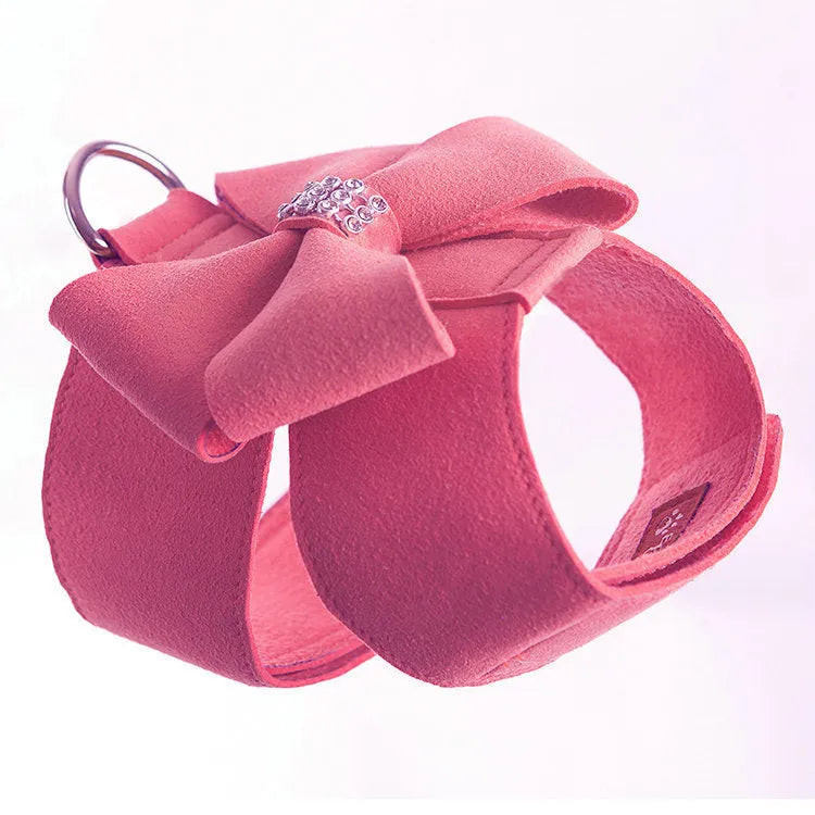Cute pink puppy harness with a bowknot, made from soft microfiber, shown on a small dog.