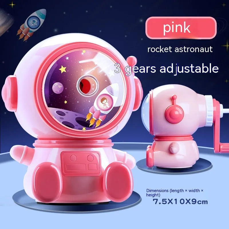 Blue astronaut cartoon manual pencil sharpener for children on a white background