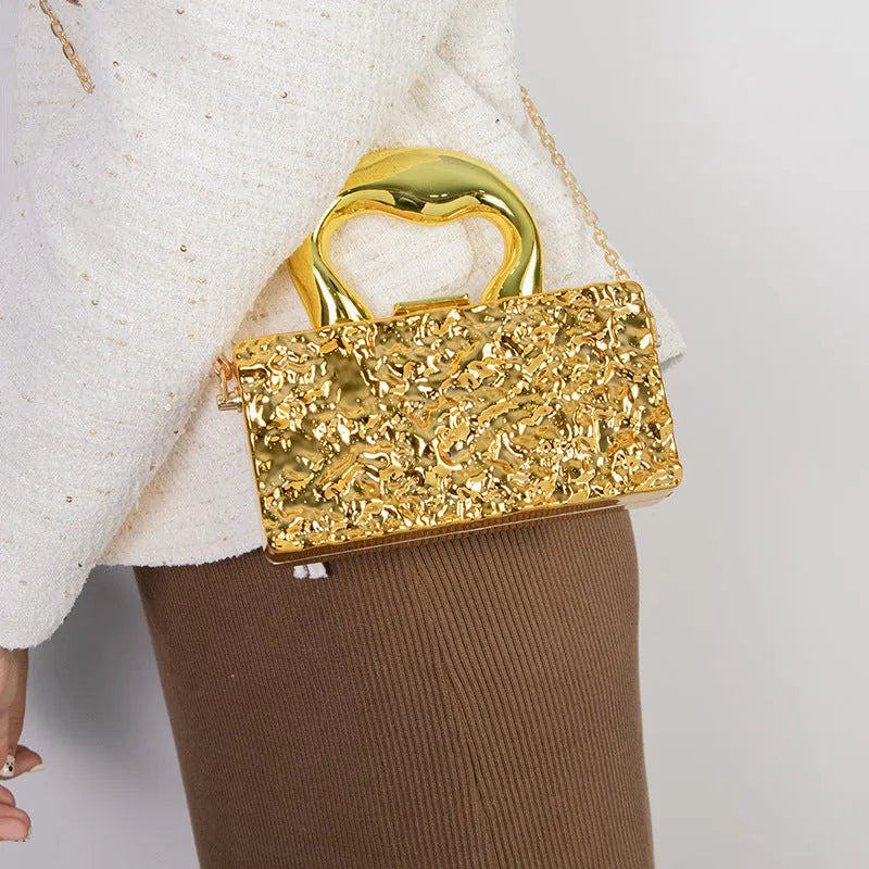 Mini acrylic crossbody bag with chain strap in Silver Corrugated colour