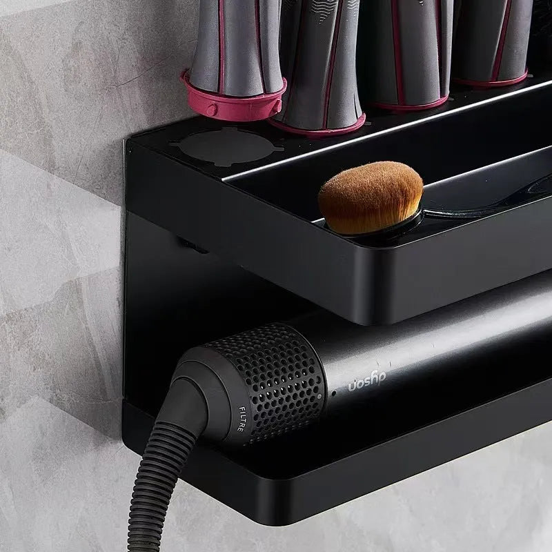 White double-layer punch-free aluminium rack holding hair curlers on a bathroom wall.