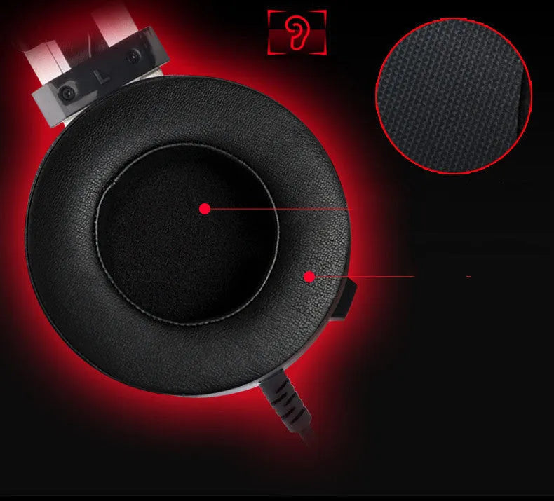 Black wired computer gaming headset with 3.5mm plug and long cable.