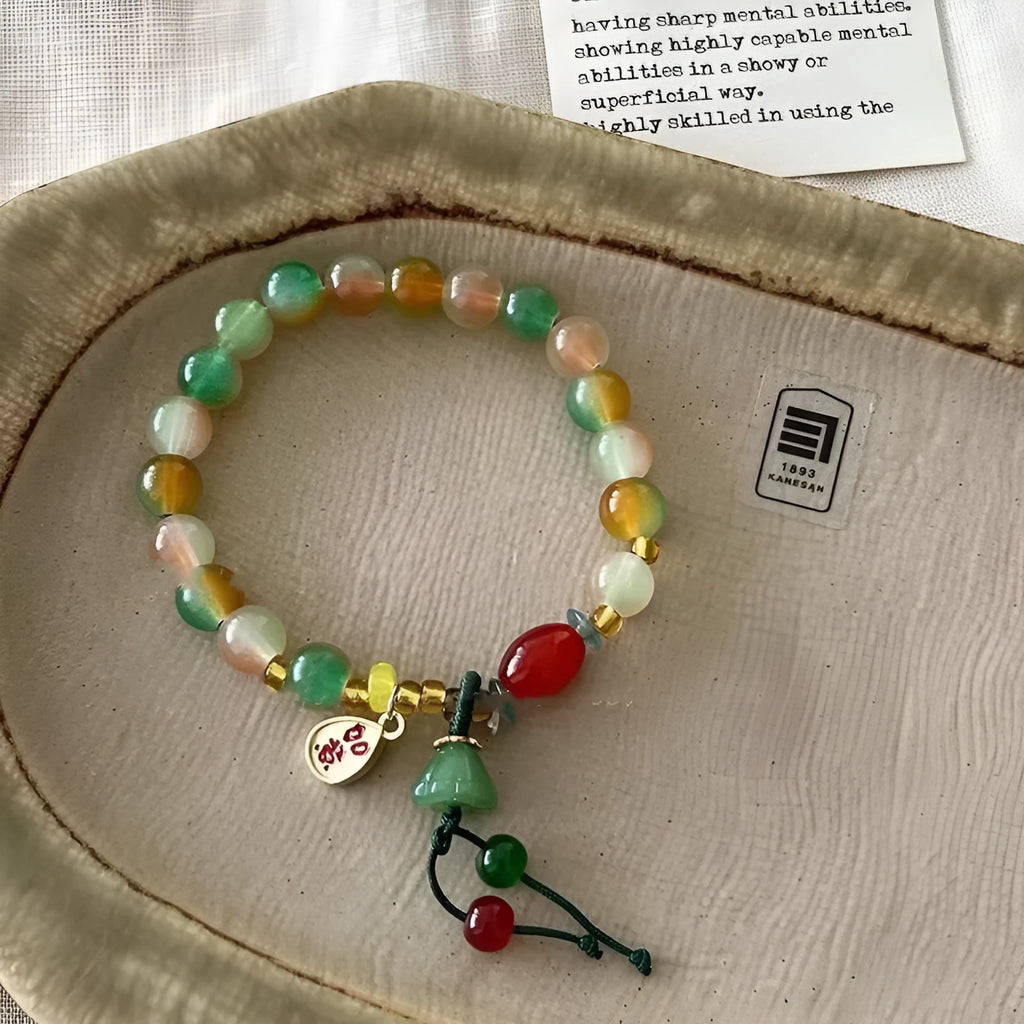 M990 Lotus Ruyi bracelet showing lotus decorative elements and mixed material construction
