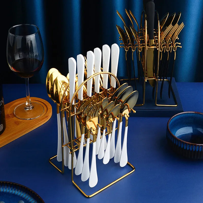 24-piece stainless steel cutlery set with storage rack showing knives forks spoons in metallic finish