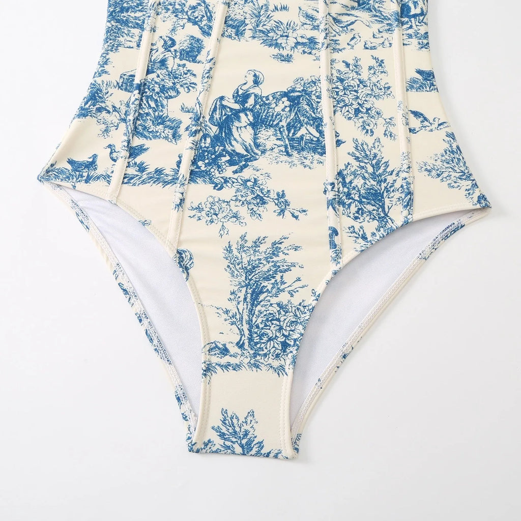 Blue women's one-piece swimsuit with matching gauze skirt set on mannequin