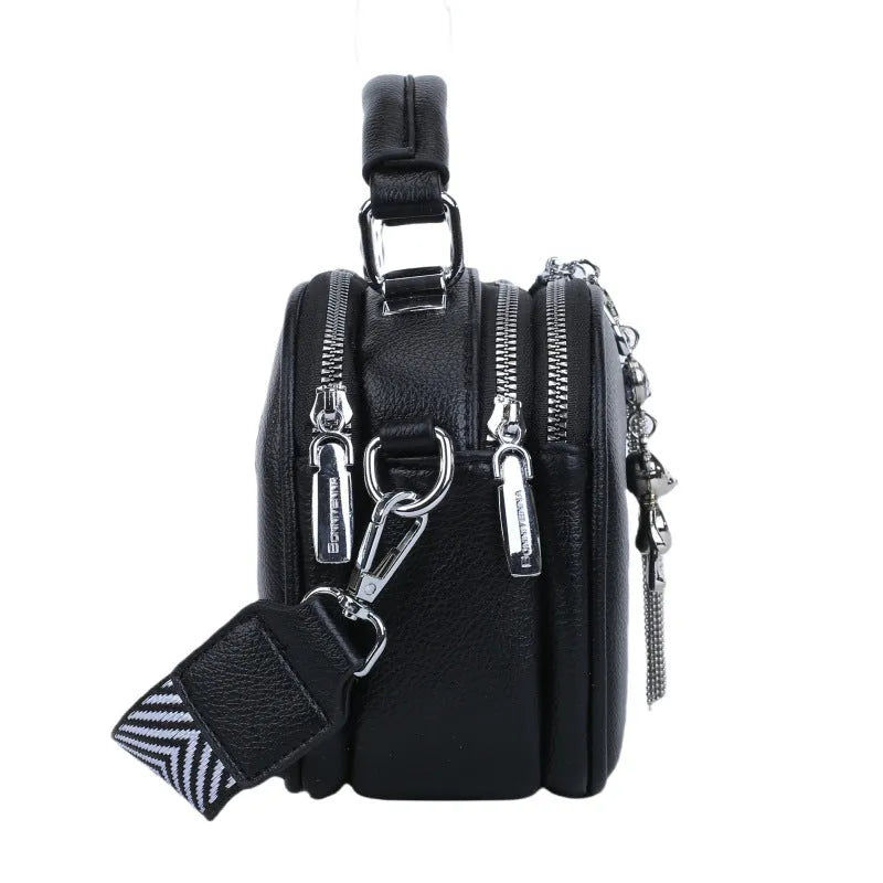 Women's small square stitching bag in PU material showing oval shape and double shoulder straps