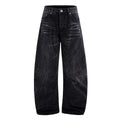 Black men's straight-leg jeans with a distressed lightning crack pattern on the legs.