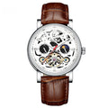 Men's black mechanical watch with tourbillon, luminous hands on a metal bracelet.