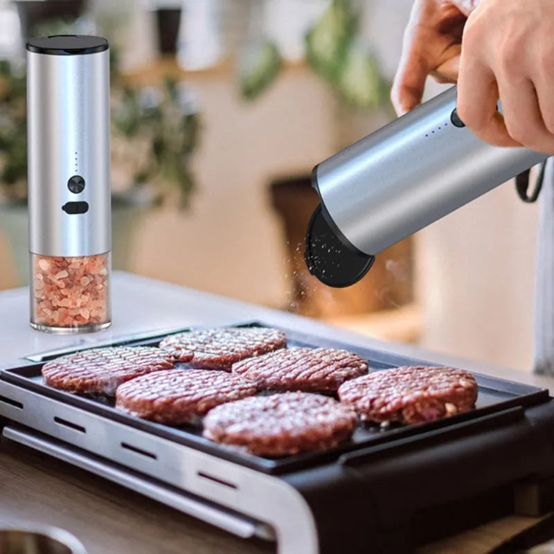 Electric salt and pepper grinder set with clear glass jar and stainless steel top
