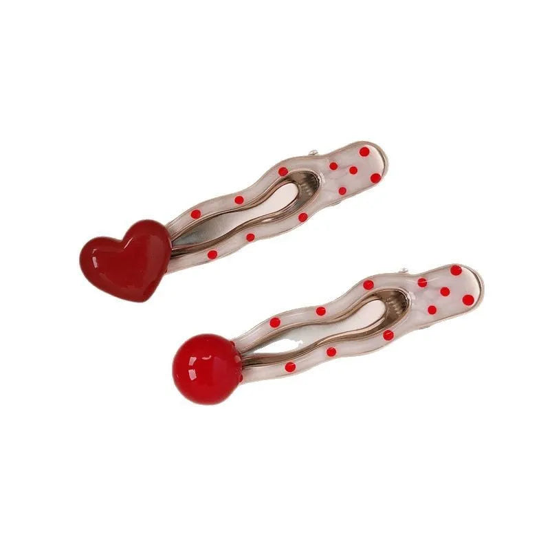 Red three-dimensional love heart hair clip with French dots and willow leaf decoration