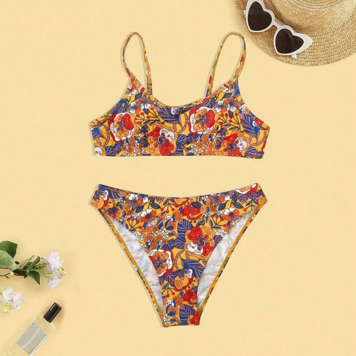 Plus size women's floral print bikini with adjustable straps, two-piece swimsuit set in colourful patterns