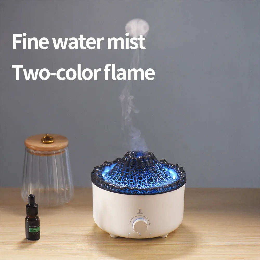 White columnar simulated flame volcano humidifier with remote control on wooden surface