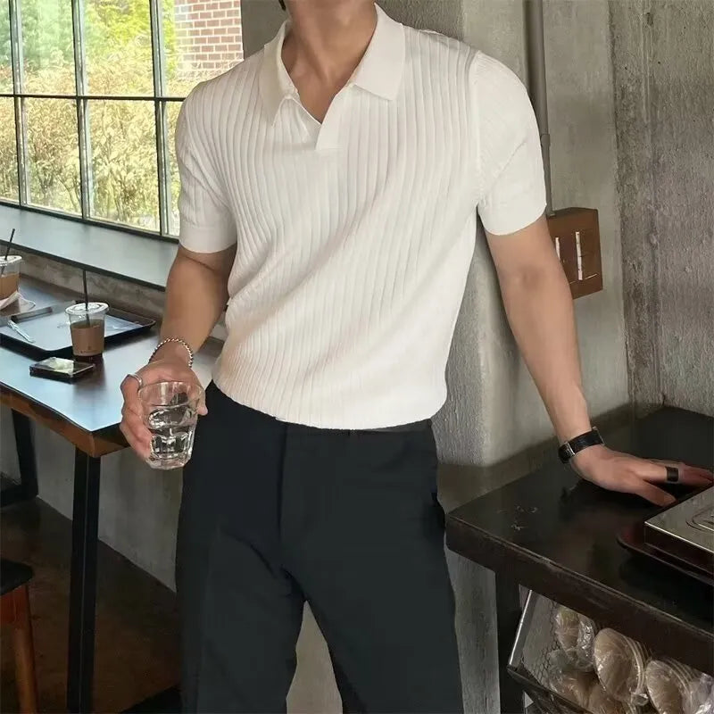 Men's black short sleeve polo shirt with a cotton ice silk knit and classic collar.