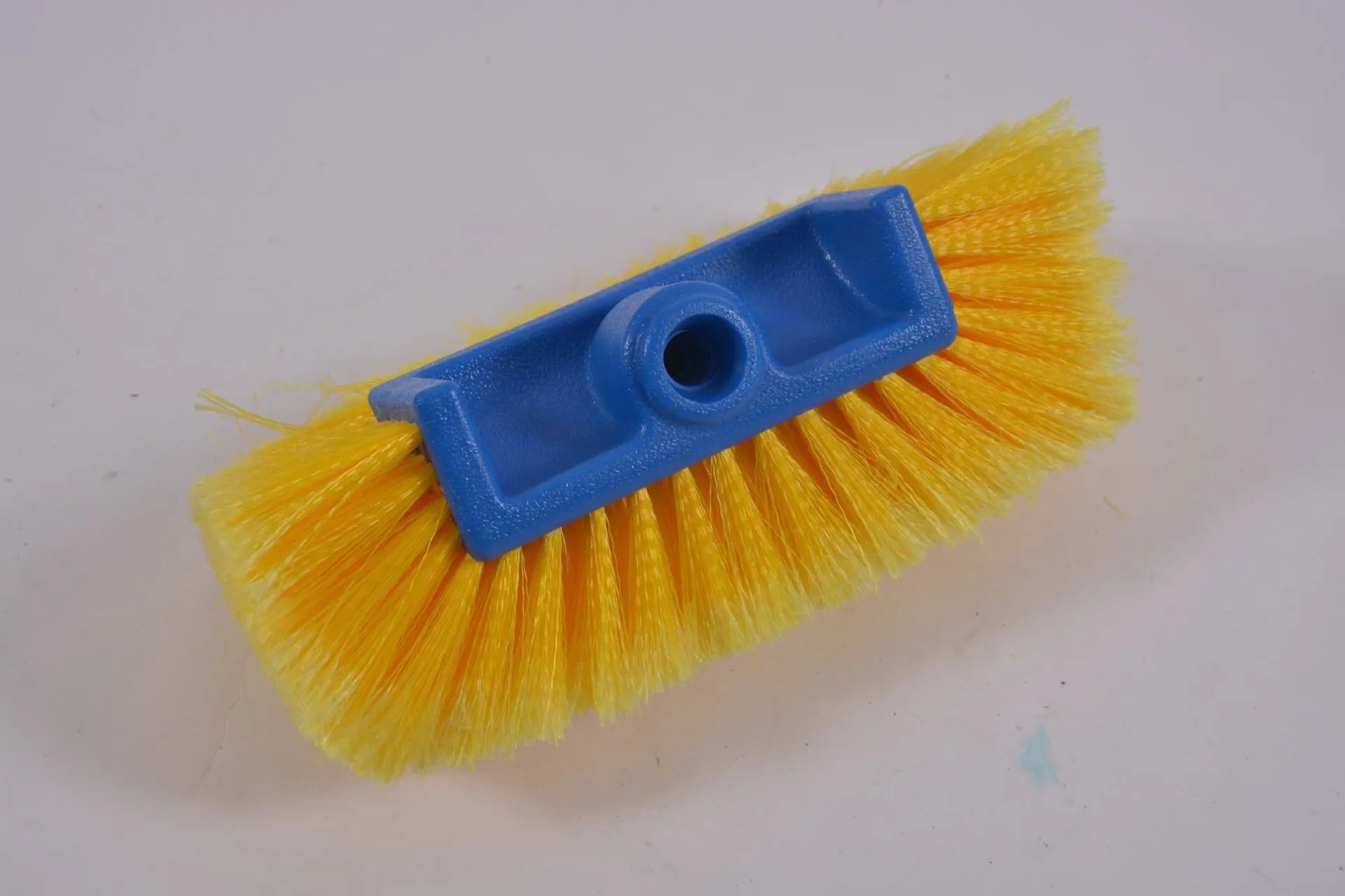 Yellow portable car wash brush with four-section removable rod and flow-through brush head